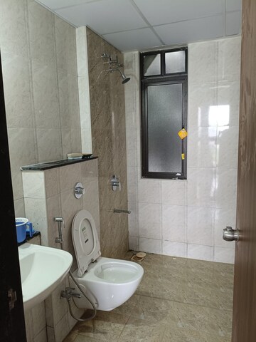 Bathroom in 2 BHK Apartment at Mantra Insignia, Mundhwa – for Rent