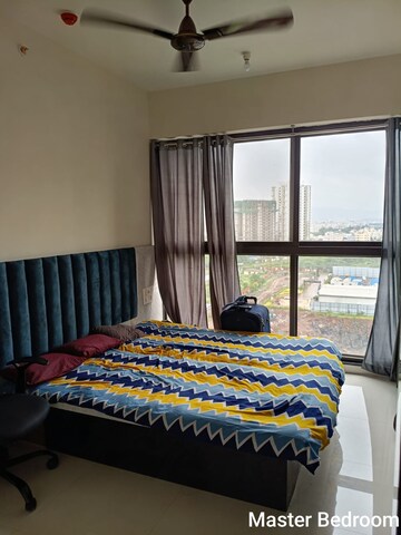Bedroom in 2 BHK Apartment at Mantra Insignia, Mundhwa – for Rent