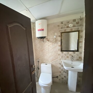 Bathroom in 2 BHK Apartment at Aims Golf Avenue I, Sector 75 – for Rent