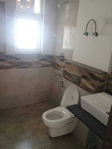 Bathroom in 4 BHK Apartment at ATS Triumph, Sector 104 – for Rent