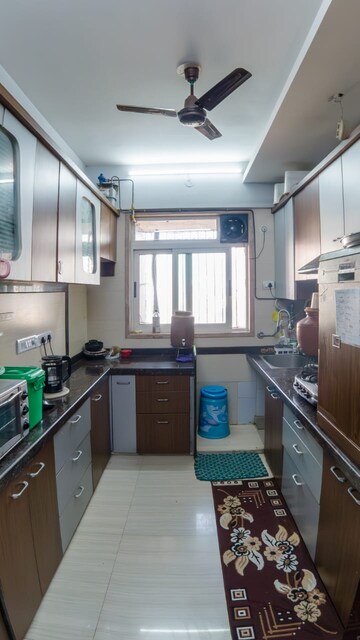 Kitchen in 3 BHK Apartment at Pride Presidency Luxuria, Ghodbunder Road – for Sale