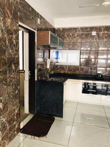 Kitchen in 3 BHK Apartment at Shree Balaji Wind Park, Near Nirma University On Sg Highway – for Rent
