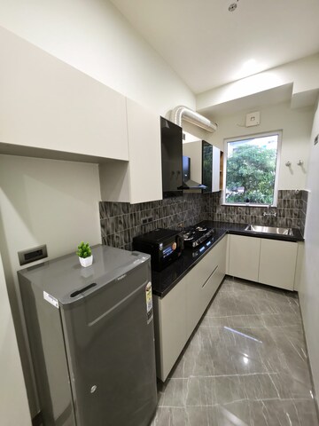 Kitchen in 1 BHK Apartment at Unitech Uniworld Gardens 2, Sector 47 – for Rent