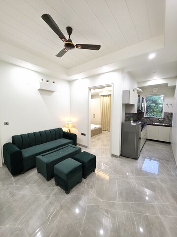 Living Room in 1 BHK Apartment at Unitech Uniworld Gardens 2, Sector 47 – for Rent