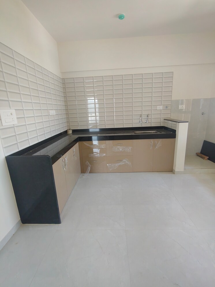 Kitchen, nyati-exuberance-1 2 Bedroom 703 Sq.Ft. Apartment In Undri Pune 9099353