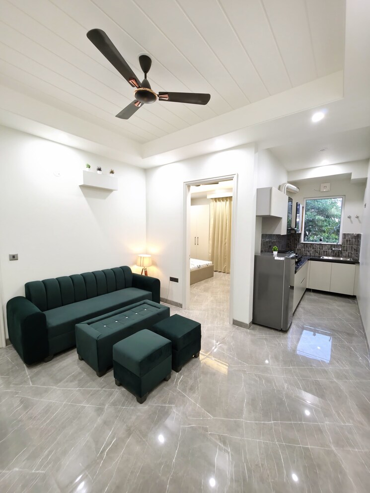 Living Room, unitech-uniworld-gardens-2 2 Bedroom 973 Sq.Ft. Apartment In Sector 47 Gurgaon 9099408