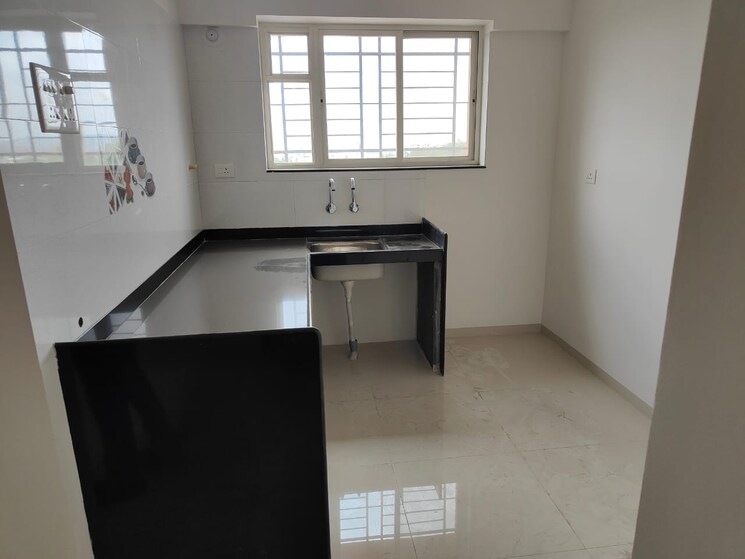 Kitchen, ashish-laxmi-angan 1 Bedroom 600 Sq.Ft. Apartment In Vadgaon Budruk Pune 9099423