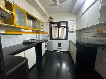 Kitchen in 2 BHK Apartment at Wellington Apartment, Andheri West – for Rent