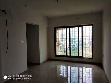 Living Room in 2 BHK Apartment at Lashkaria Anurag CHS, Andheri West – for Rent