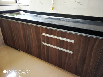 Kitchen in 2 BHK Apartment at Lashkaria Anurag CHS, Andheri West – for Rent