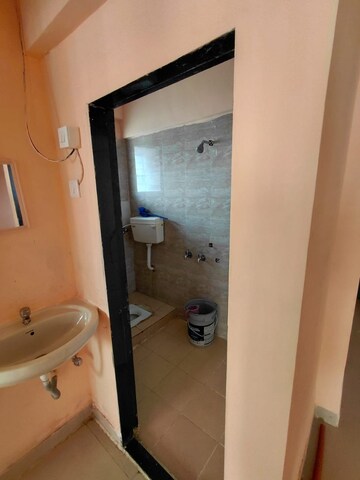 Bathroom in 2 BHK Apartment at Shatrughan Kutir CHS, Yashaswi Nagar – for Rent