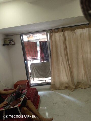Living Room in 2 BHK Apartment at Mohini Castle, Khar West – for Rent