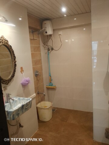 Bathroom in 2 BHK Apartment at Mohini Castle, Khar West – for Rent