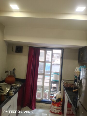Living Room in 2 BHK Apartment at Mohini Castle, Khar West – for Rent
