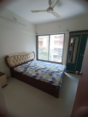 Bedroom in 2 BHK Apartment at Royal Oasis, Malad West – for Rent