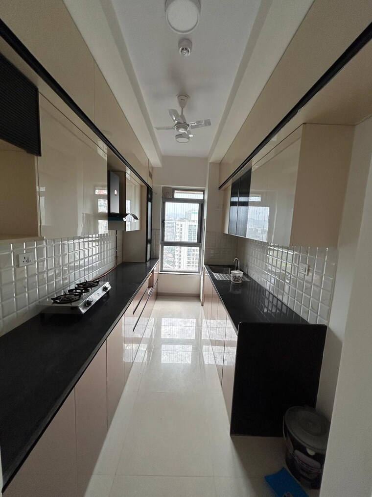 Kitchen, kalpataru-immensa 2 Bedroom 808 Sq.Ft. Apartment In Kolshet Road Thane 9099779