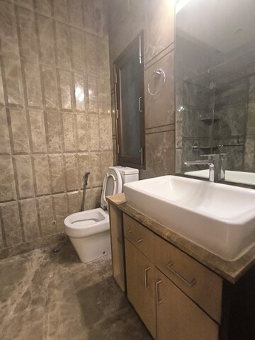 Bathroom in 3 BHK Apartment at Prithviraj Road – for Rent