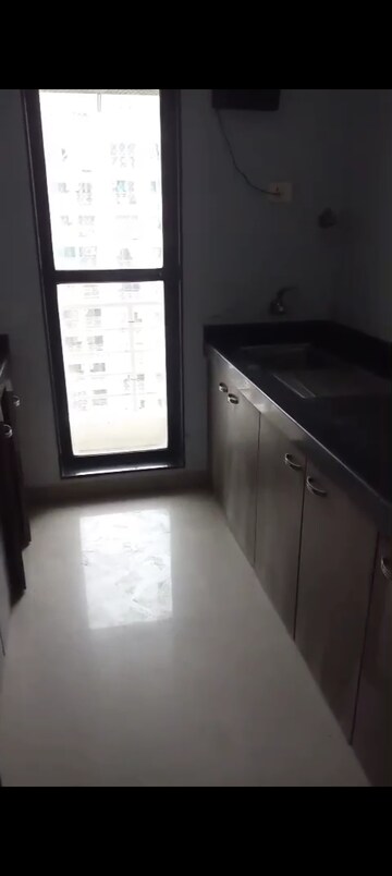 Kitchen in 3 BHK Apartment at Atul Blue Meadows, Andheri East – for Rent