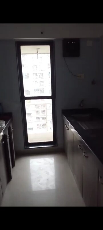 Kitchen in 3 BHK Apartment at Atul Blue Meadows, Andheri East – for Rent