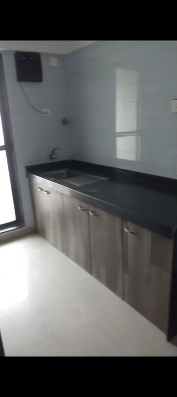 Kitchen in 3 BHK Apartment at Atul Blue Meadows, Andheri East – for Rent
