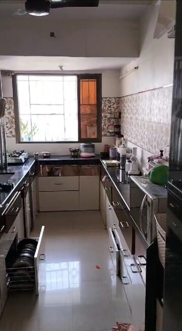 Kitchen in 2 BHK Apartment at Saibaba CHS, Kandivali West – for Sale