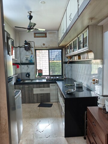 Kitchen in 2 BHK Apartment at Serenity Complex, Andheri West – for Sale