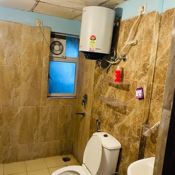 Bathroom in 3 BHK Apartment at Amrapali Silicon City, Sector 76 – for Rent