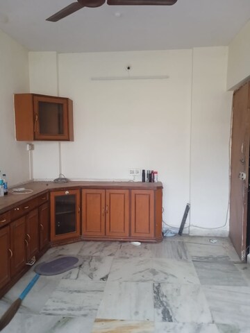 Kitchen in 1 BHK Apartment at Kausthubham CHS, Goregaon East – for Rent