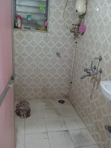 Bathroom in 1 BHK Apartment at Kausthubham CHS, Goregaon East – for Rent