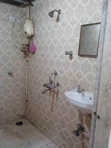 Bathroom in 1 BHK Apartment at Kausthubham CHS, Goregaon East – for Rent