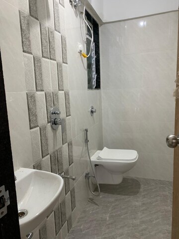 Bathroom in 2 BHK Apartment at Swapna Siddhi CHS, Borivali West – for Rent