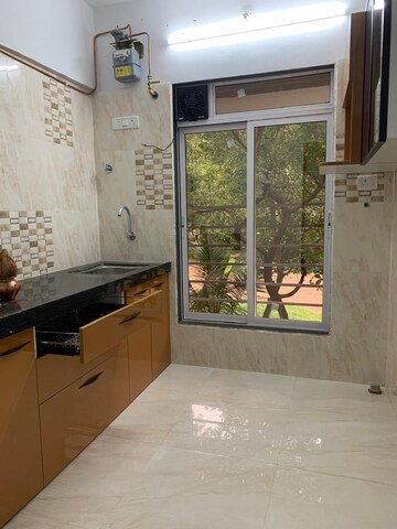 Kitchen in 2 BHK Apartment at Swapna Siddhi CHS, Borivali West – for Rent
