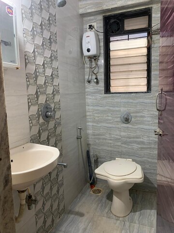 Bathroom in 2 BHK Apartment at Ambika Bholanath Chogle Residency, Borivali West – for Rent