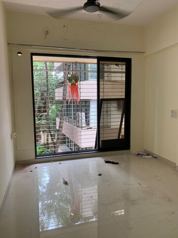 Room in 2 BHK Apartment at Ambika Bholanath Chogle Residency, Borivali West – for Rent