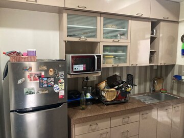 Kitchen in 2 BHK Apartment at Kalpataru Sunrise Grande, Kolshet Road – for Rent