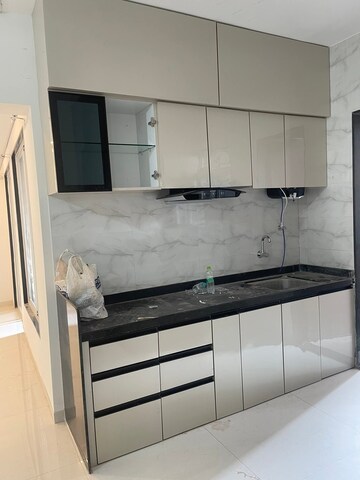 Kitchen in 2 BHK Apartment at Veddant Ganesh Bella Rossa Phase 2, Punawale – for Rent