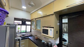 Kitchen in 1 BHK Apartment at Goyal Green Woods, Andheri East – for Rent