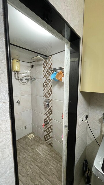 Bathroom in 1 BHK Apartment at Goyal Green Woods, Andheri East – for Rent