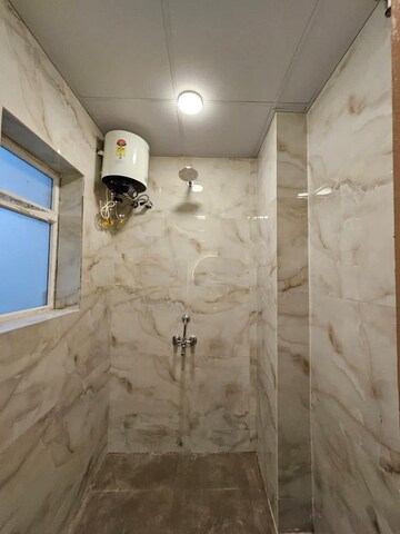 Bathroom in 2 BHK Builder Floor at Freedom Fighters Enclave – for Rent
