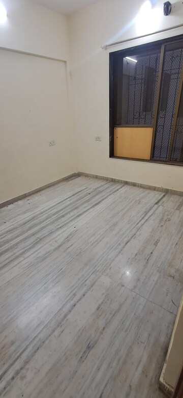 Room in 1 BHK Apartment at Gemstar Nestle Apartments, Malad West – for Rent