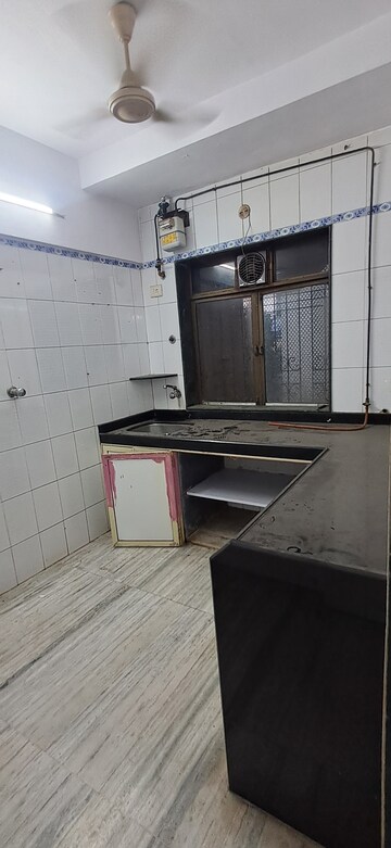 Kitchen in 1 BHK Apartment at Gemstar Nestle Apartments, Malad West – for Rent