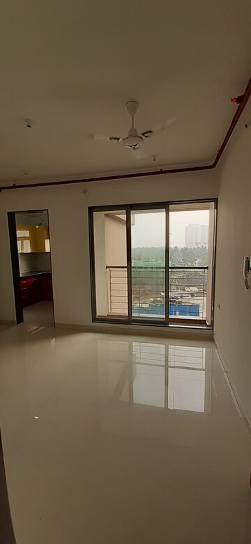 Living Room in 2 BHK Apartment at Runwal Eirene, Balkum Pada – for Rent