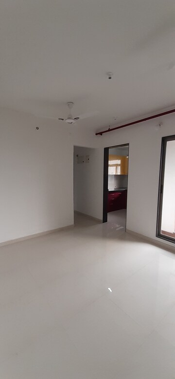Living Room in 2 BHK Apartment at Runwal Eirene, Balkum Pada – for Rent