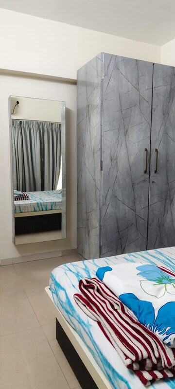 Bedroom in 2 BHK Apartment at Titanium Towers, Andheri West – for Rent
