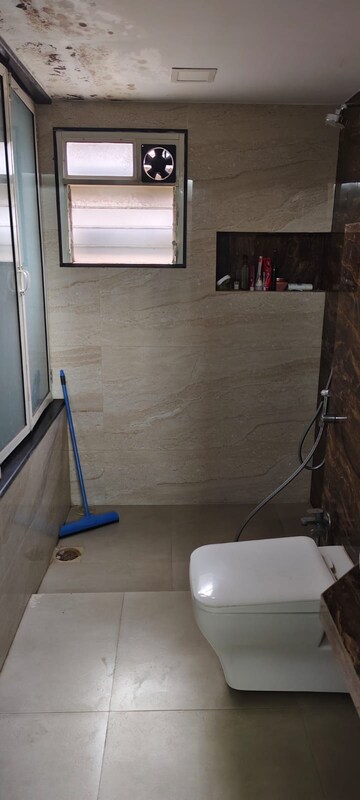 Bathroom in 2 BHK Apartment at Titanium Towers, Andheri West – for Rent