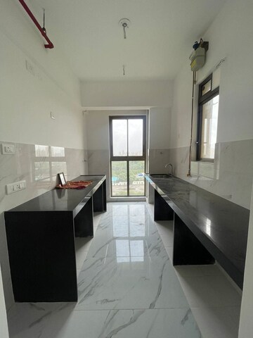 Kitchen in 2 BHK Apartment at Raymond Ten X Habitat, Pokhran Road No Two – for Rent