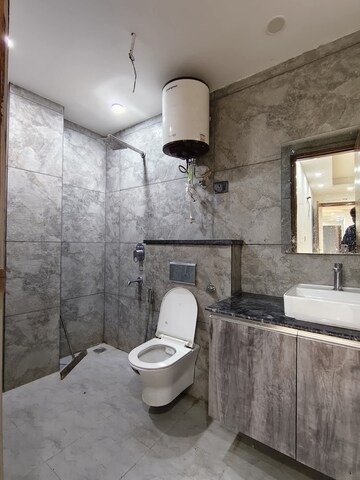 Bathroom in 3 BHK Builder Floor at Freedom Fighters Enclave – for Rent