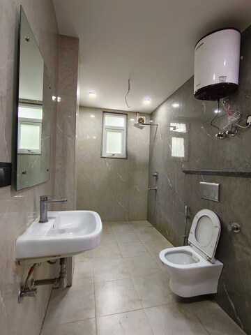 Bathroom in 3 BHK Builder Floor at Freedom Fighters Enclave – for Rent