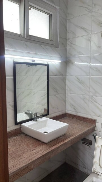 Bathroom in 2 BHK Builder Floor at Freedom Fighters Enclave – for Rent