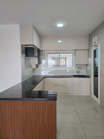 Kitchen in 4 BHK Apartment at NR Orchid Gardenia, Jakkuru – for Rent